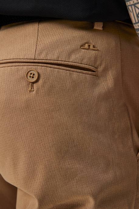 J.Lindeberg tuuletushousut miehet tiikeriruskea 4VD0421 vaatetus