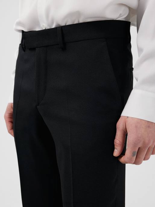 J.Lindeberg myöntää aktiiviset housut miehet musta 4VD01230 vaatetus